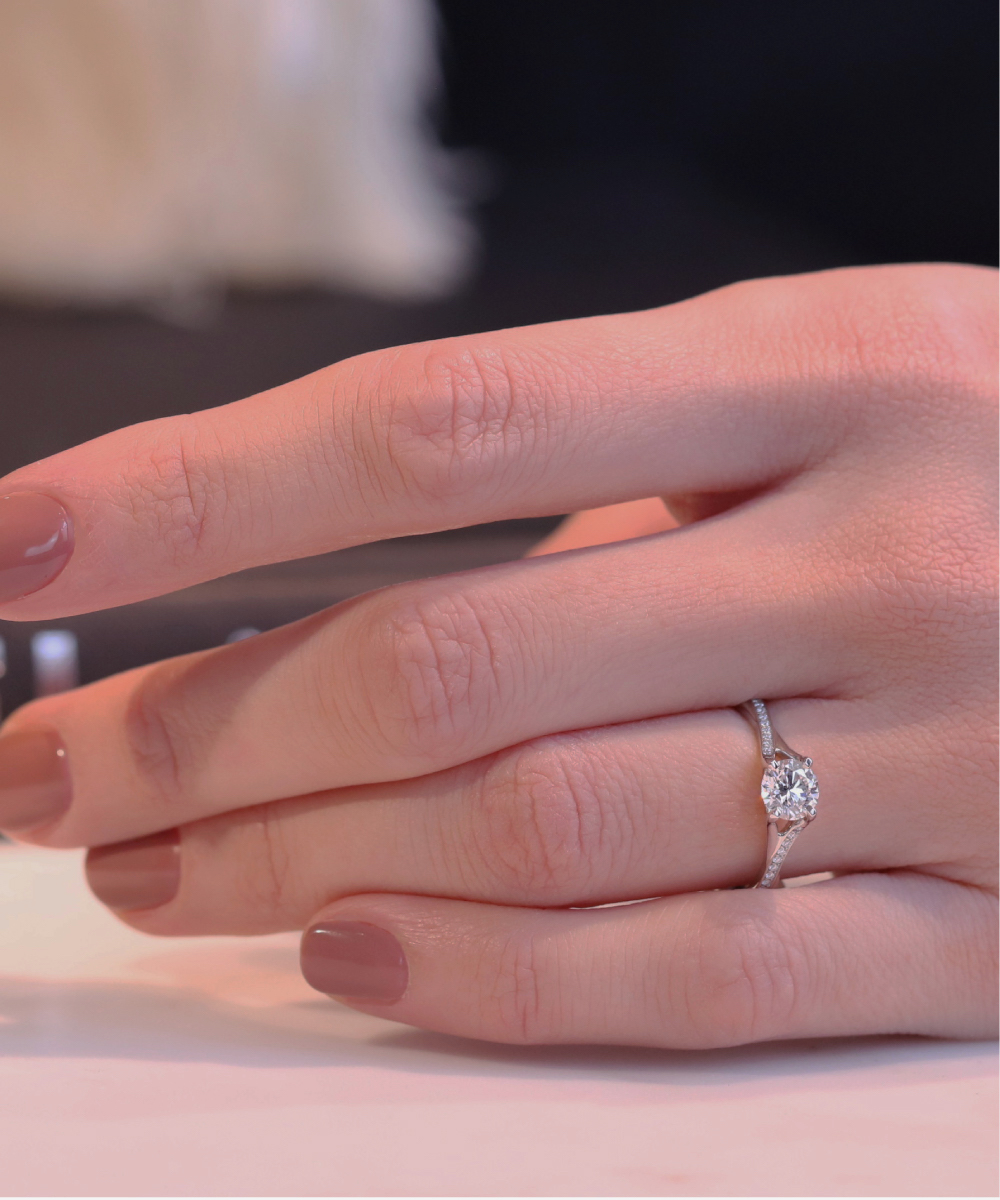 Round Brilliant Cut Diamond Plaited Engagement Ring