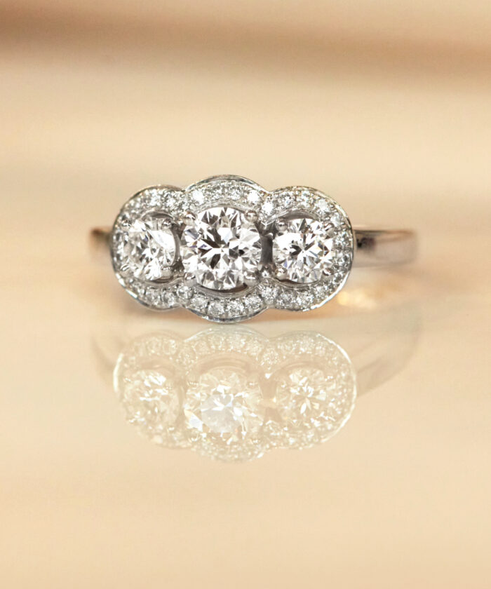Unique Platinum 3 Stone Round Diamond Halo Engagement Ring