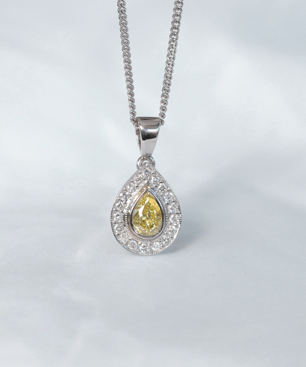 Pear Cut Yellow Diamond Halo Pendant