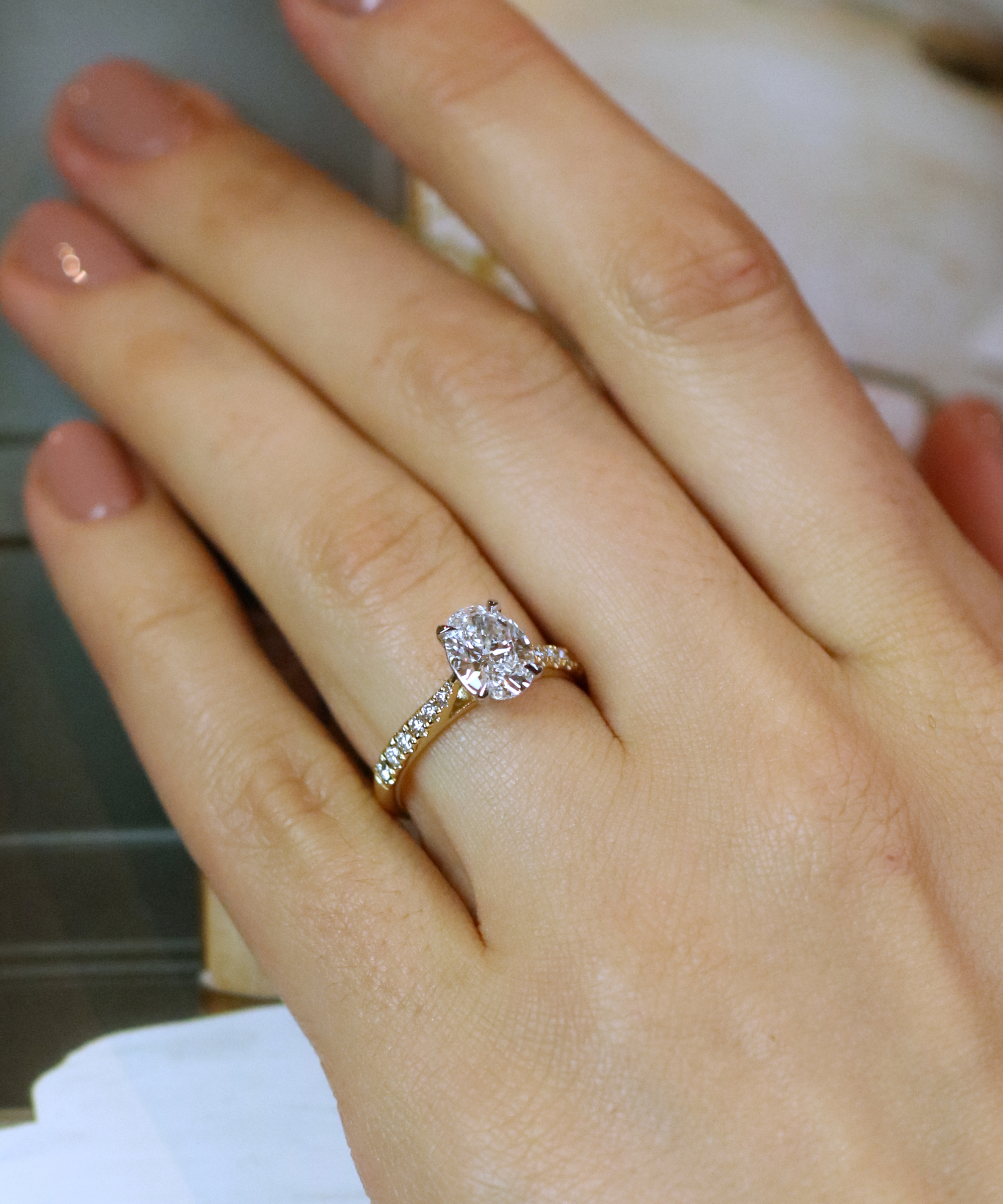 18ct Yellow Gold 1.50ct Oval Cut Lab Grown Diamond Ring with Diamondd Set Shoulders - Modelled