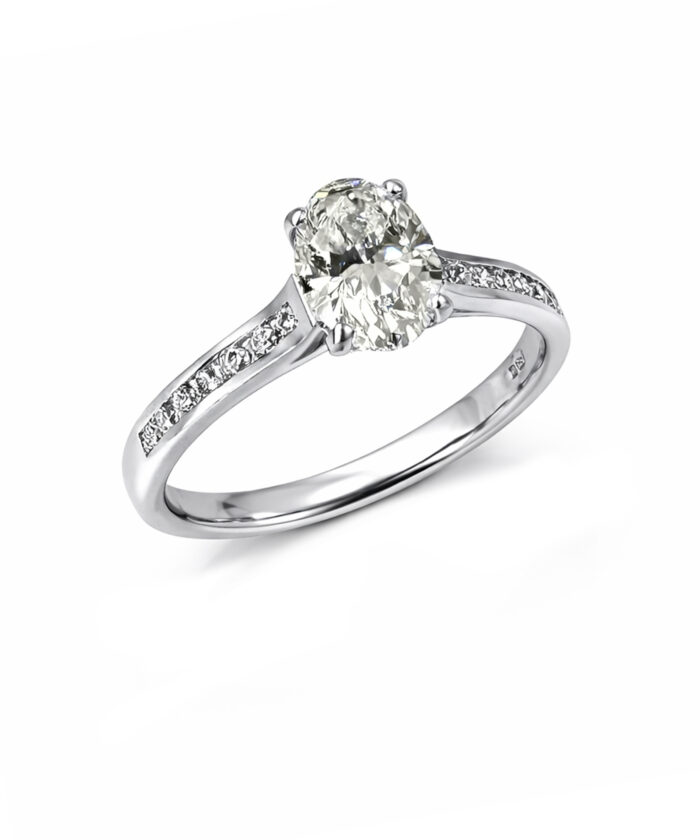 Pre-owned Oval Cut Diamond Solitaire Engagement Ring with Channel Set Shoulders